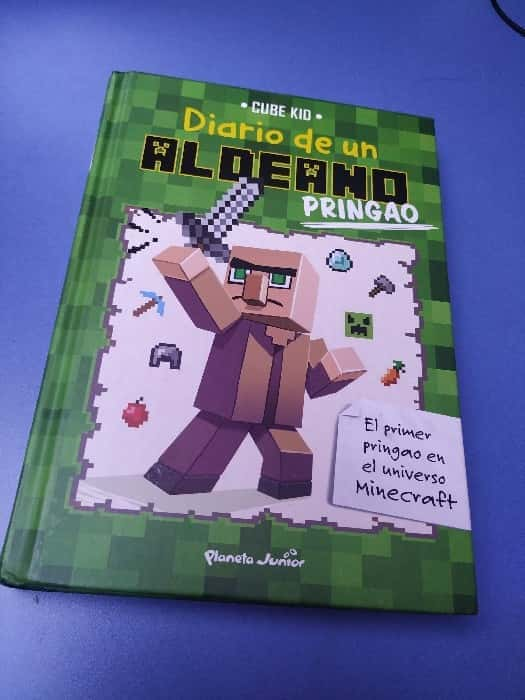 Minecraft. Diario de un aldeano pringao – «¡Descubre la aventura más épica del Minecraft! Diario de un aldeano pringao: Una odisea en una mundo infinito, escrita por Cube Kid»