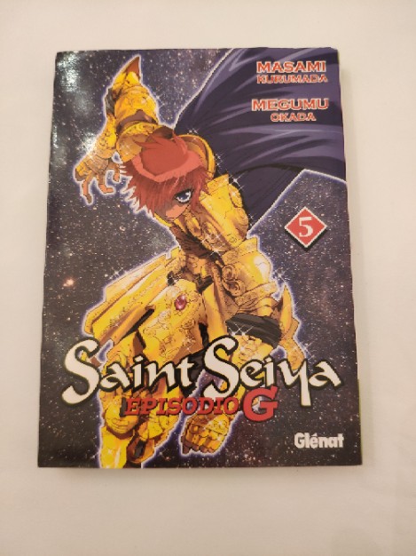 ¡Adéntrate en la Emoción Cósmica con «Saint Seiya Episodio G 5 (Shonen)» de Masami Kurumada y Megumu Okada, una Obra Maestra de Glénat!